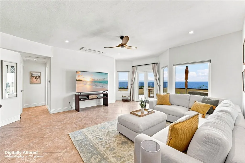 Oversized seating, new TV & double-door access to an expansive patio with endless views Oversized seating, new TV & double-door access to an expansive patio with endless views