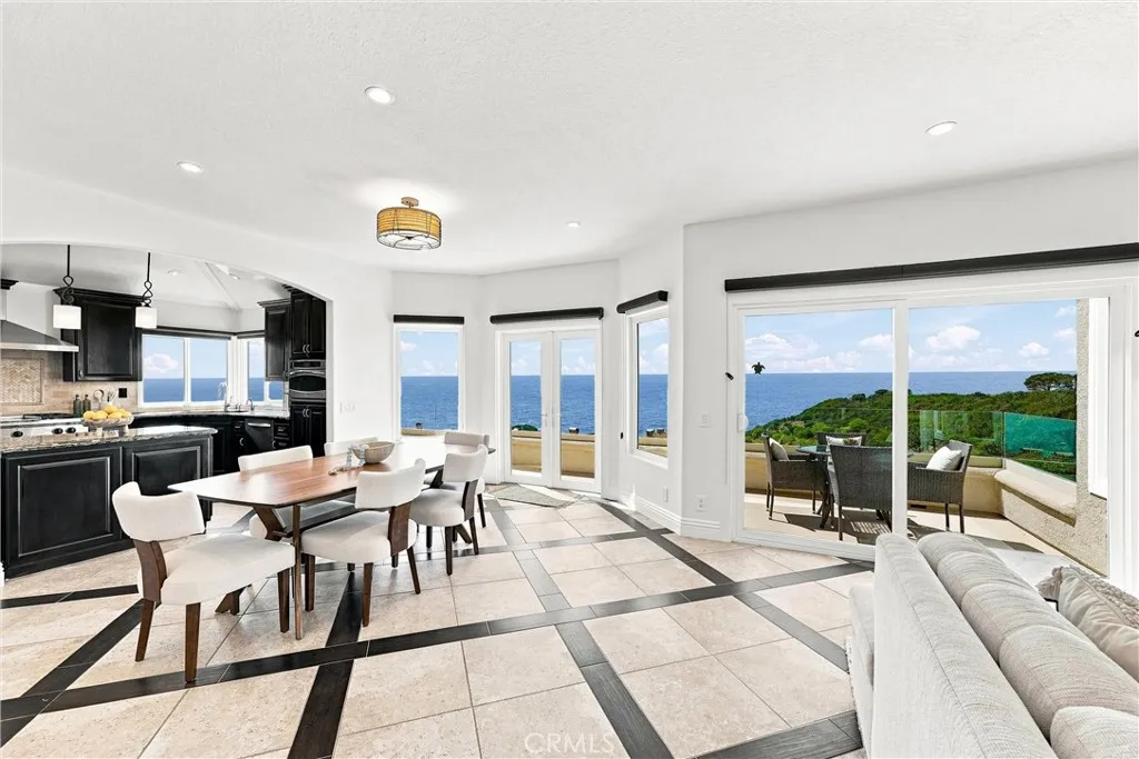 Spacious Indoor Dining or Alfresco Deck Dining with Ocean Views Spacious Indoor Dining or Alfresco Deck Dining with Ocean Views