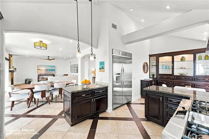 Open-Concept Kitchen Flowing into Dining & Living Areas