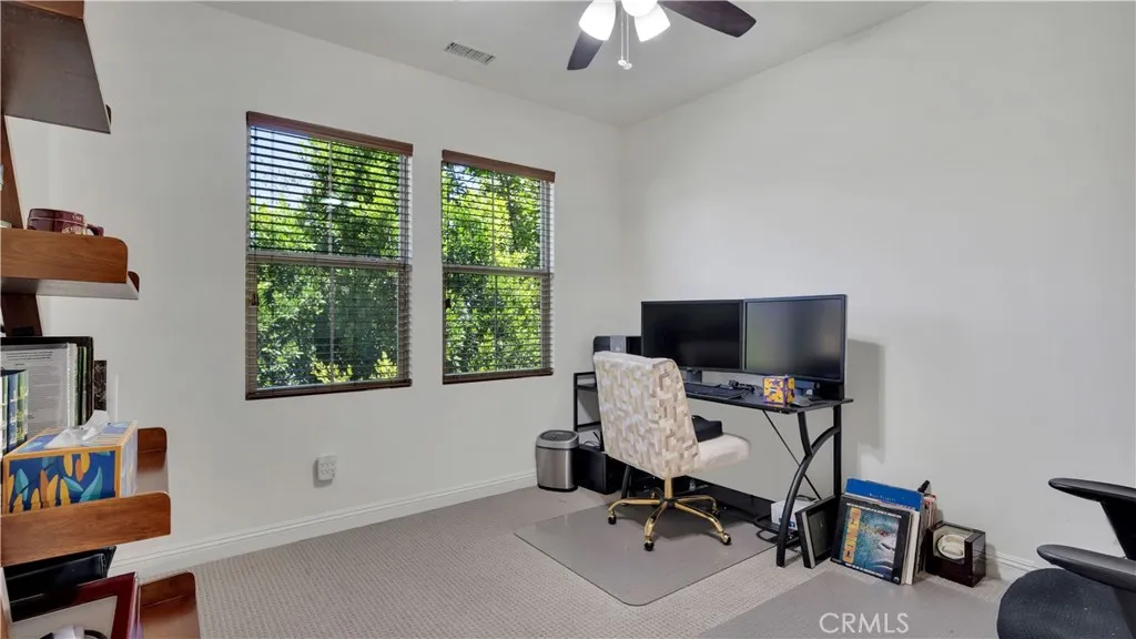 fourth bedroom currently styled as a home office, offering flexible use fourth bedroom currently styled as a home office, offering flexible use