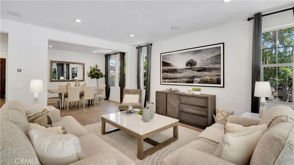 Living room overlooking the dining area and kitchen Living room overlooking the dining area and kitchen