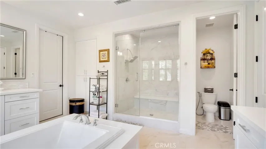 Additional view of the primary bathroom and its refined finishes