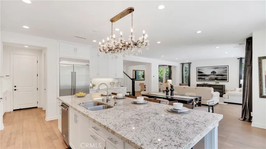 Open-concept kitchen and living area with generous gathering space