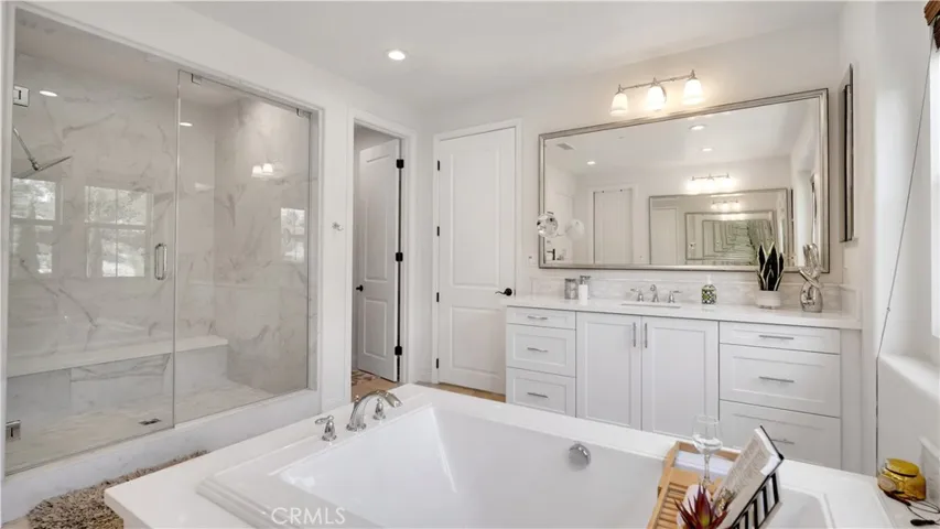 Primary bathroom with an inviting, thoughtfully designed layout