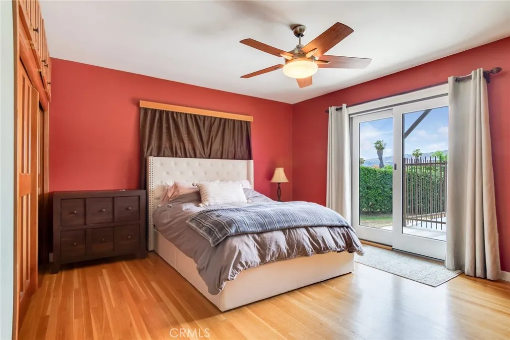Primary Bedroom with sliding door to backyard Primary Bedroom with sliding door to backyard