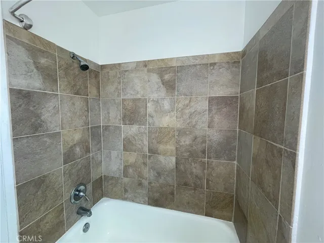 Tile shower walls with tub