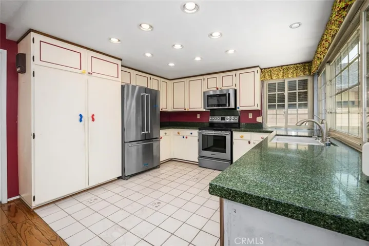 Pantry cabinet and recessed lighting.