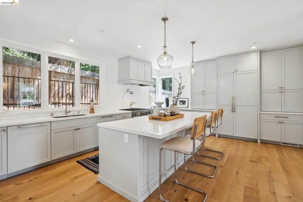 Light wood-finish flooring with white walls Light wood-finish flooring with white walls