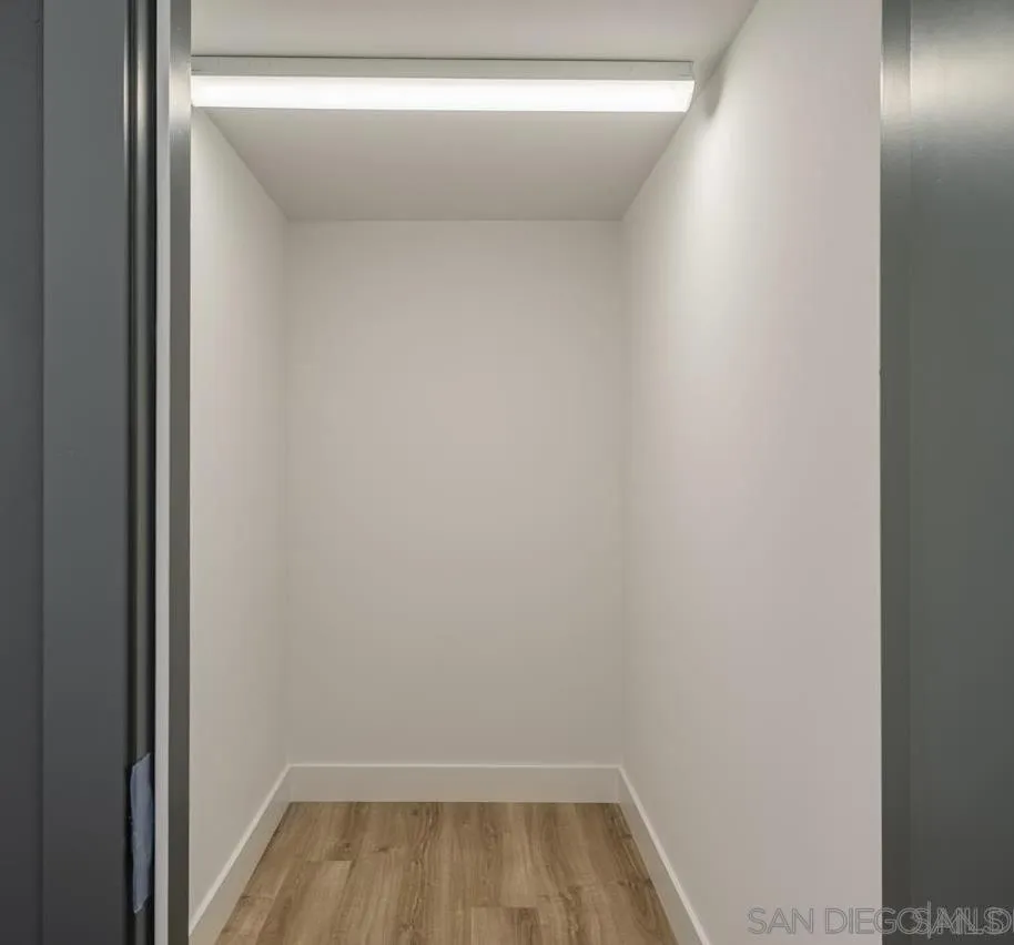 Spacious storage closet located conveniently outside the front door.