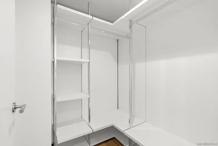 Guest bedroom/office includes a spacious walk in closet.
