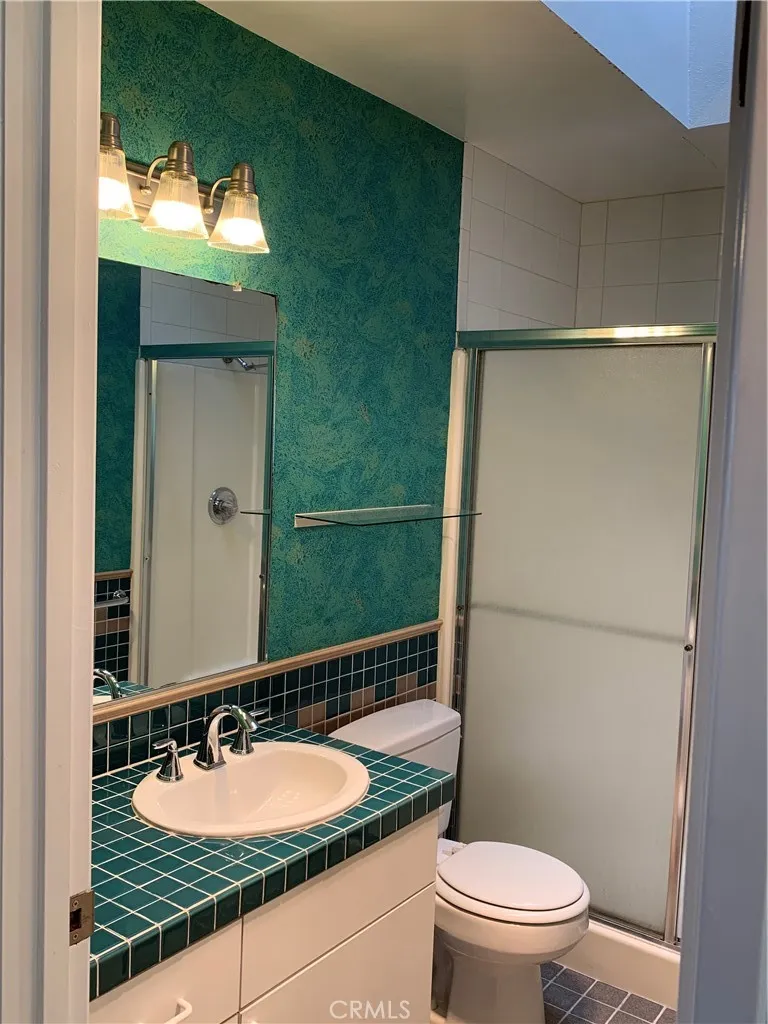Hall bath with step in shower