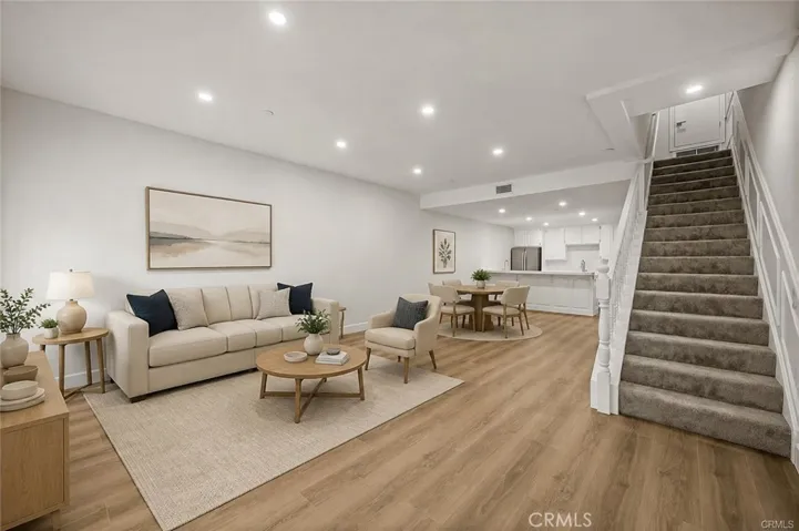 Beautiful entry level living/dining room - virtually staged