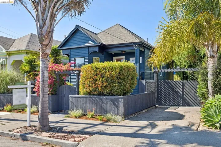 Blue exterior siding with white trim accents