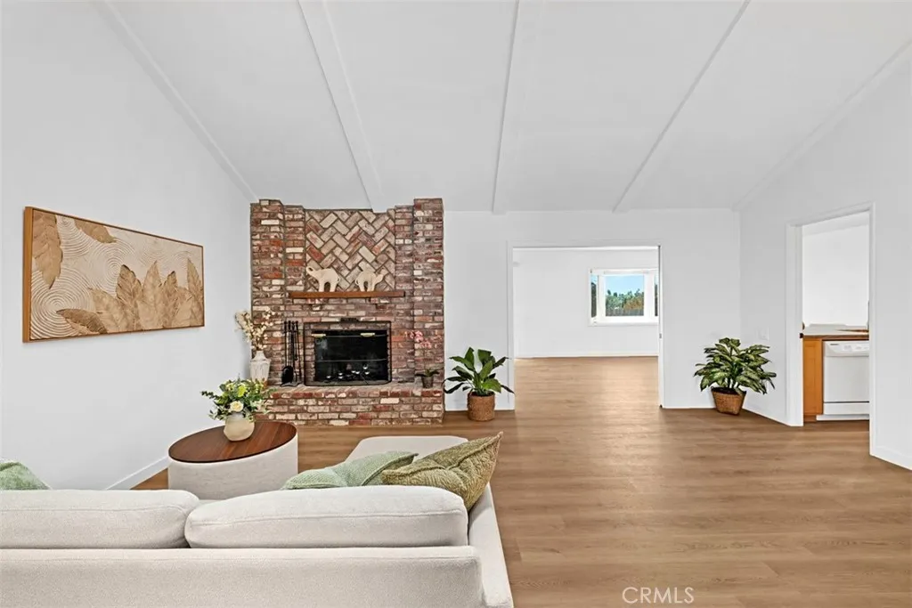 Livingroom opens to large bonus room for entertaining.