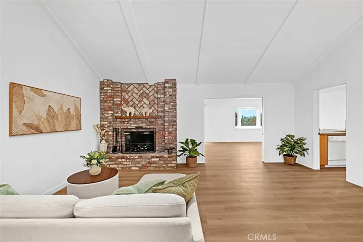 Livingroom opens to large bonus room for entertaining.