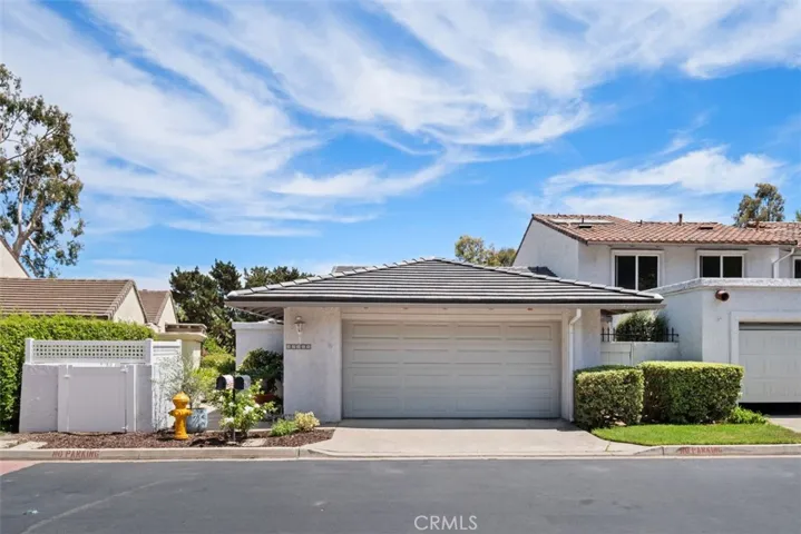 Single level situated on an elevated street to capture views.