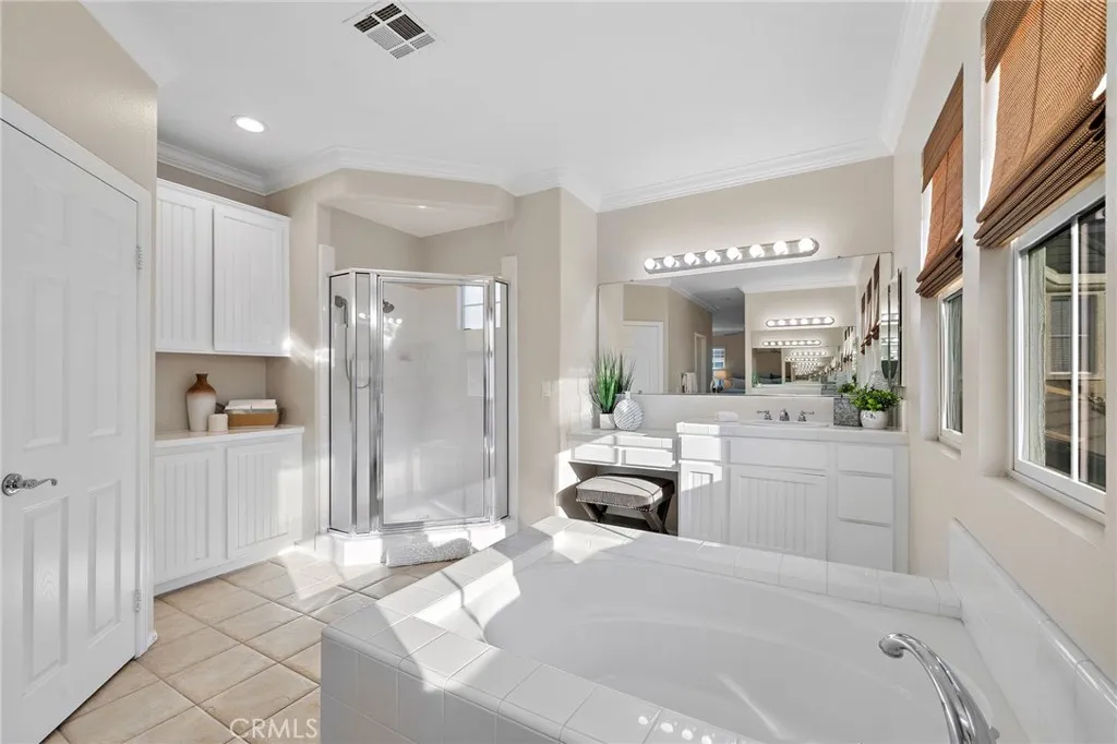 primary bath w/soaking tub, and two separate sink/vanity