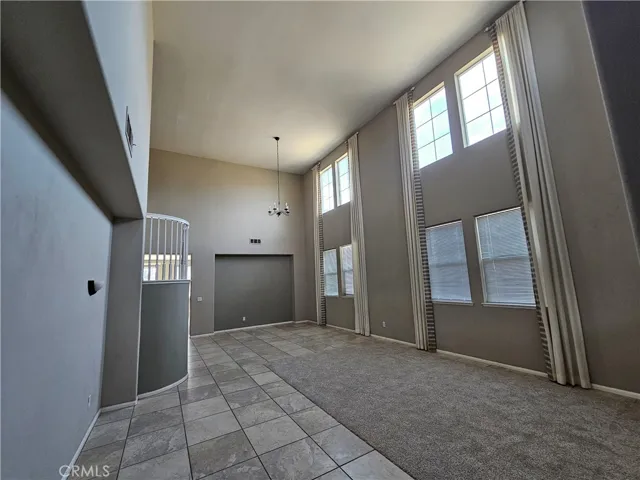 Living & dining room with high ceiling