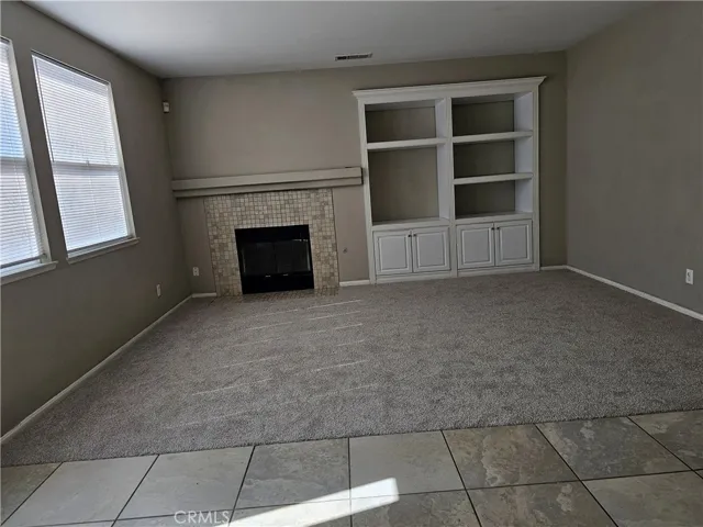 Family room with a chimney