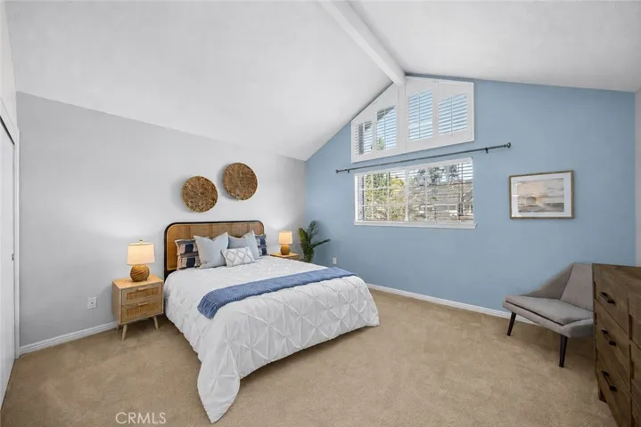 Large 2nd Bedroom has vaulted ceilings and plantation shutters