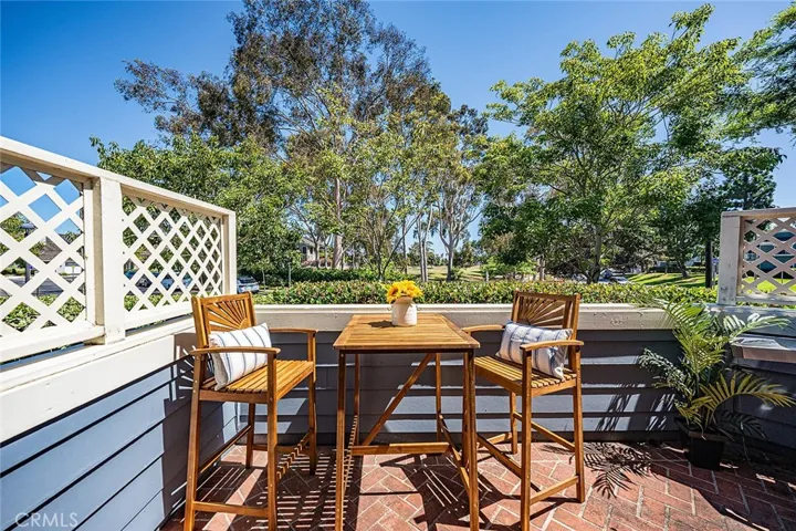 Patio off the kitchen is perfect for watching the golfers and enjoying your morning coffee