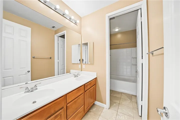 Full bathroom next to bedroom