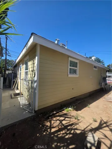 gated side yeard behind the house.