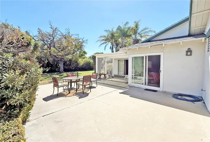 Large Open Patio, Lattice Covered Patio, BBQ, and Wrap-Around Lawn and Gardens