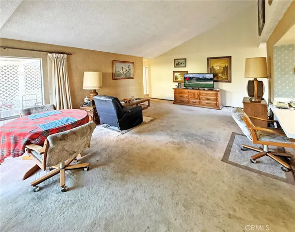 Soaring Ceiling, Dining Area, and 2 Sliders to the Backyard