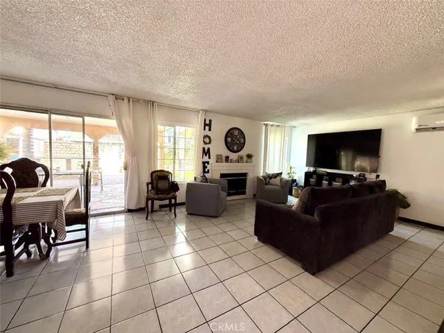 Living room/dining room with fireplace