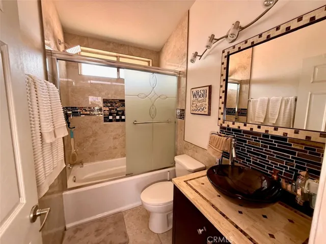 Upstairs bathroom with bathtub