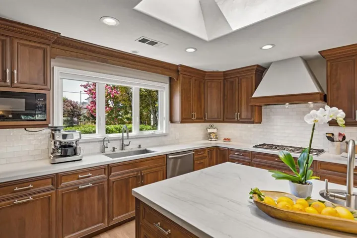 Real quartzite stone counters, cherry cabinets