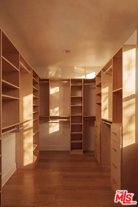 Primary Walk-In Closet Primary Walk-In Closet