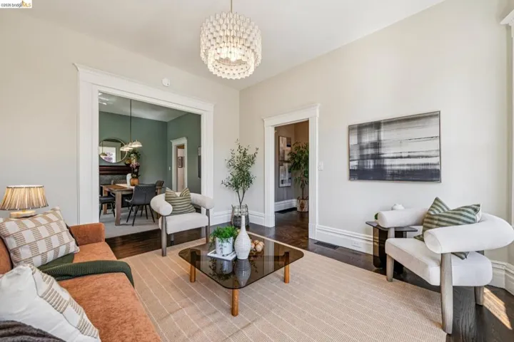 High ceilings and dark wood-finish flooring