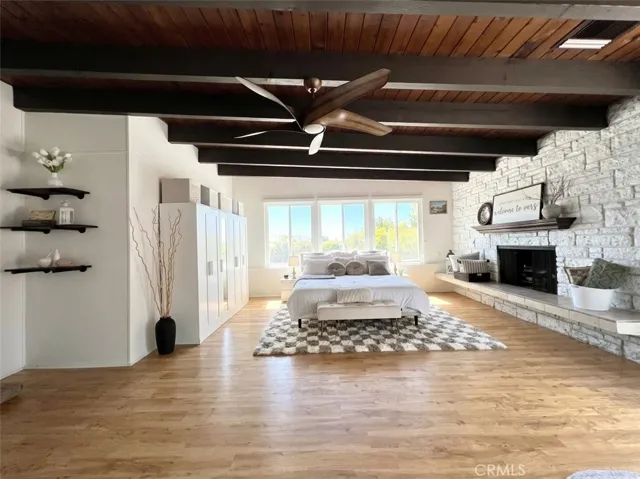 Primary Bedroom with Decorative Fireplace