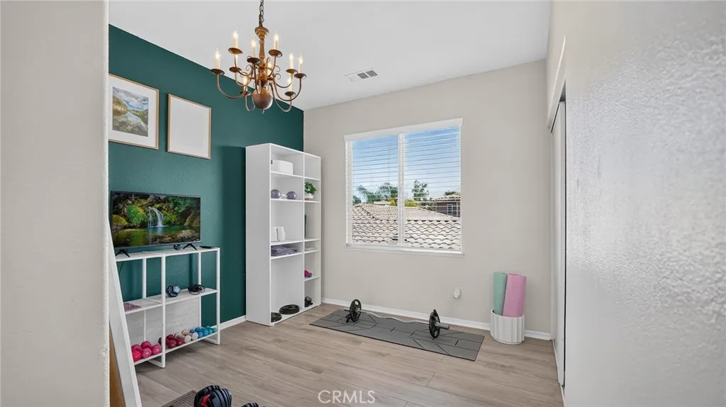 Secondary bedroom upstairs currently being used as a workout room
