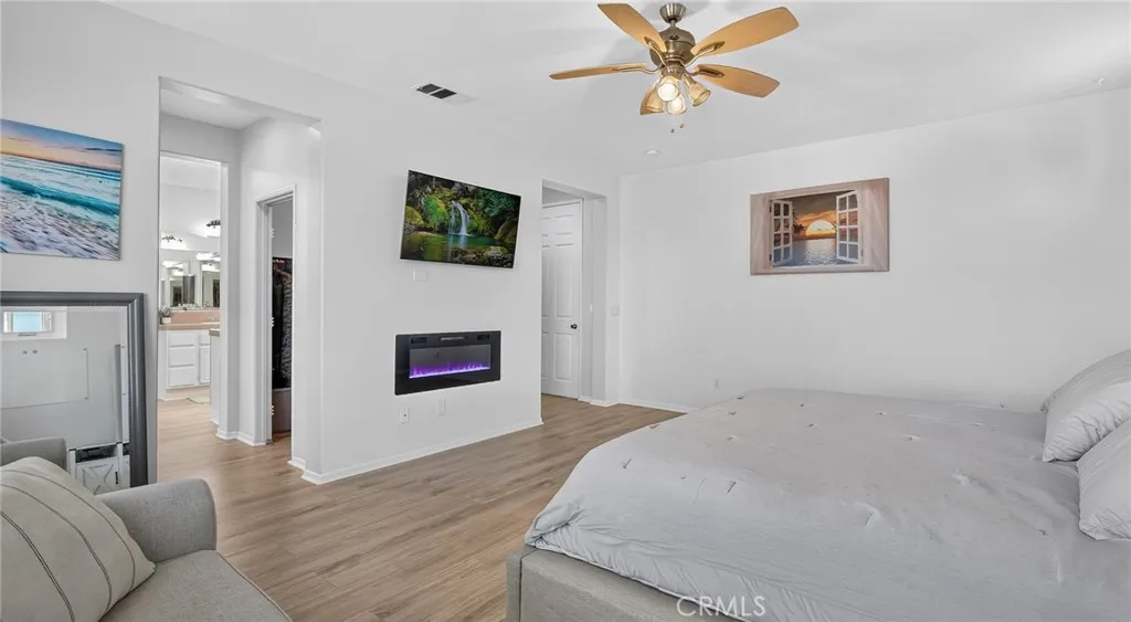 w/ Ceiling Fans and electric fireplace feature