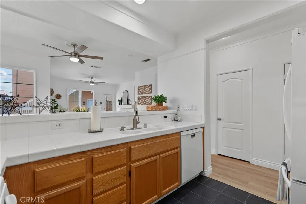 Kitchen open to dining area and living room.