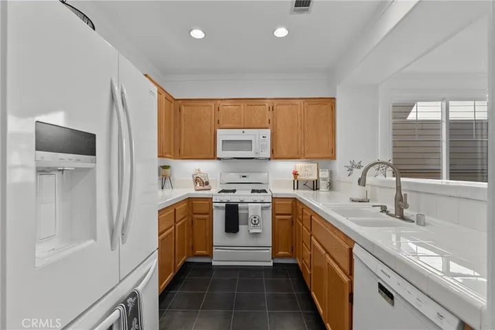 Kitchen open to dining area.