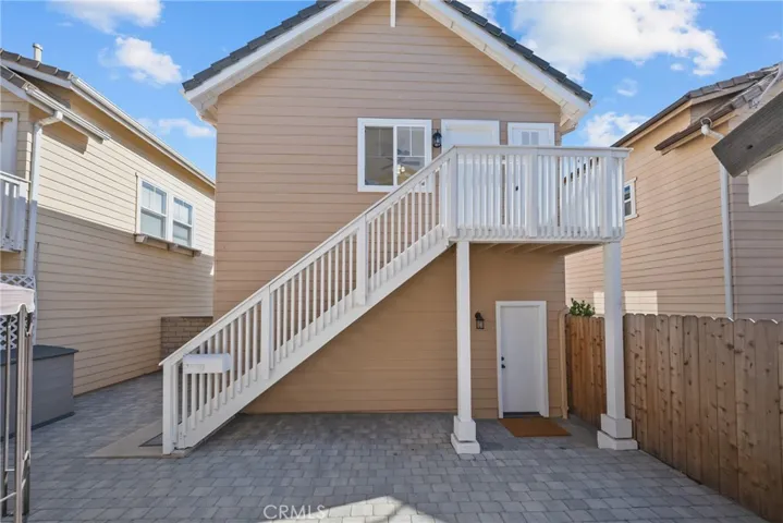 Staircase to the 4th bedroom and full bathroom.