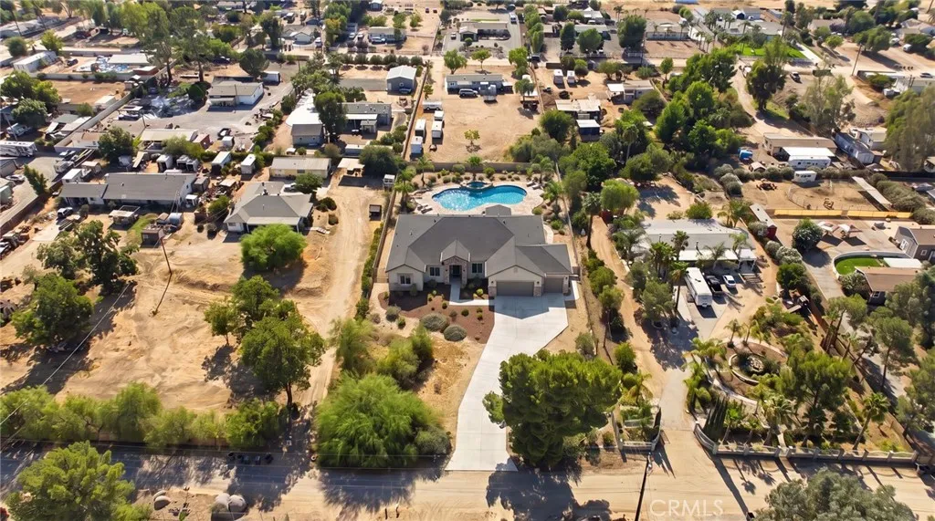 ARTISTS RENDERING of future home and pool that could be built on the property
