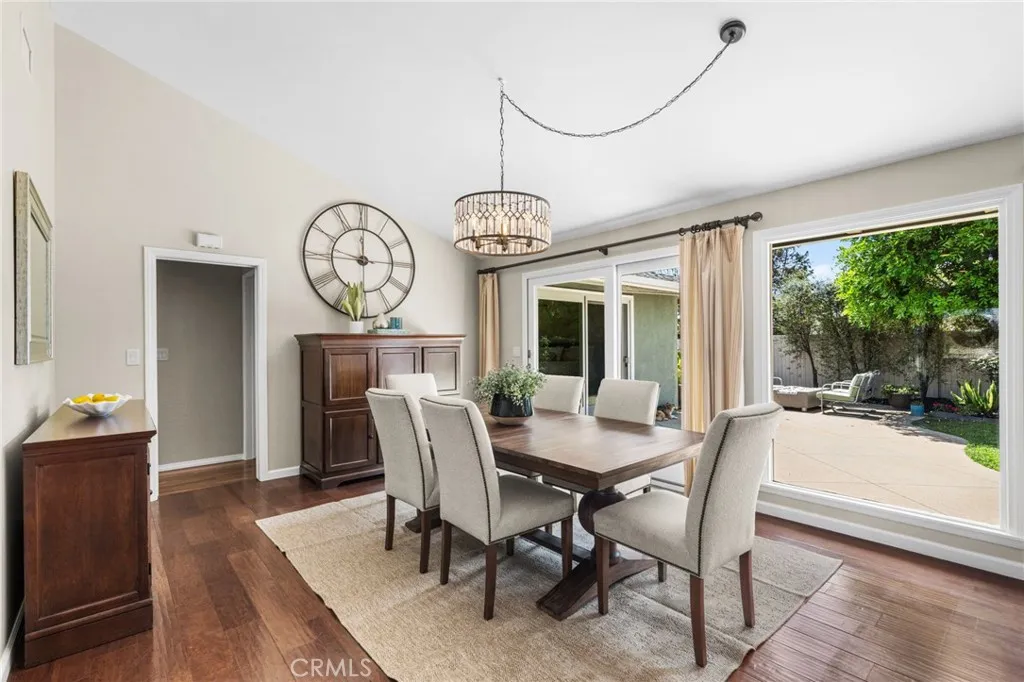Your dining space opens to slider doors for easy outdoor access