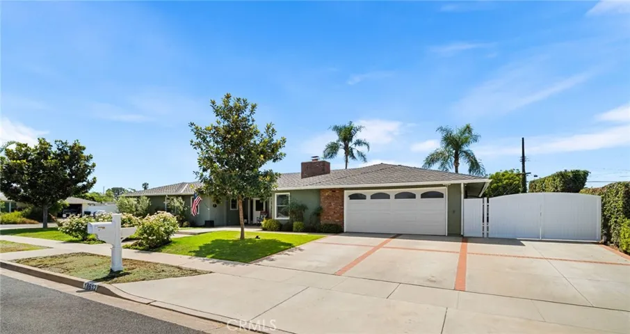 A wrap around lot offering plenty of grass, parking, RV pull through and parking.