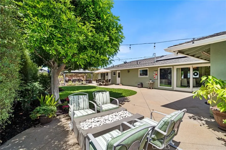 patio spaces and grassy yard