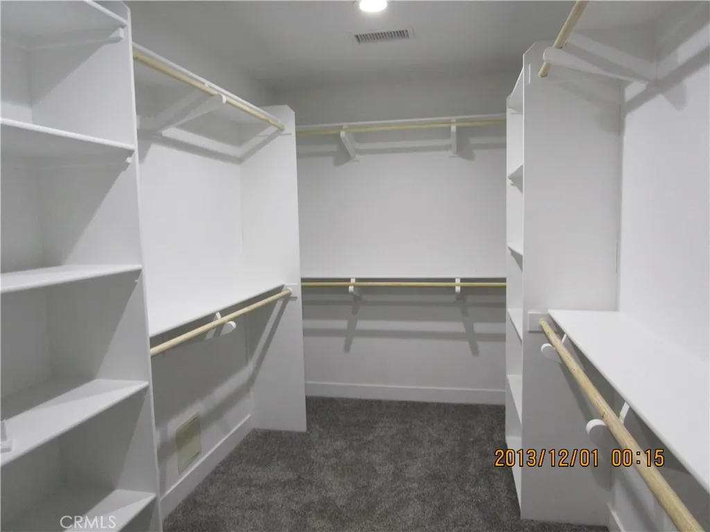 MASTER BEDROOM WALK IN CLOSET