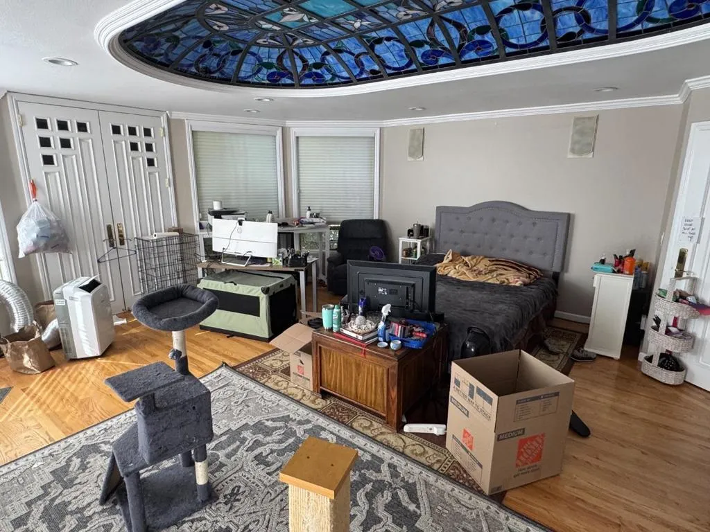 Upstairs bedroom with stain glass ceiling.