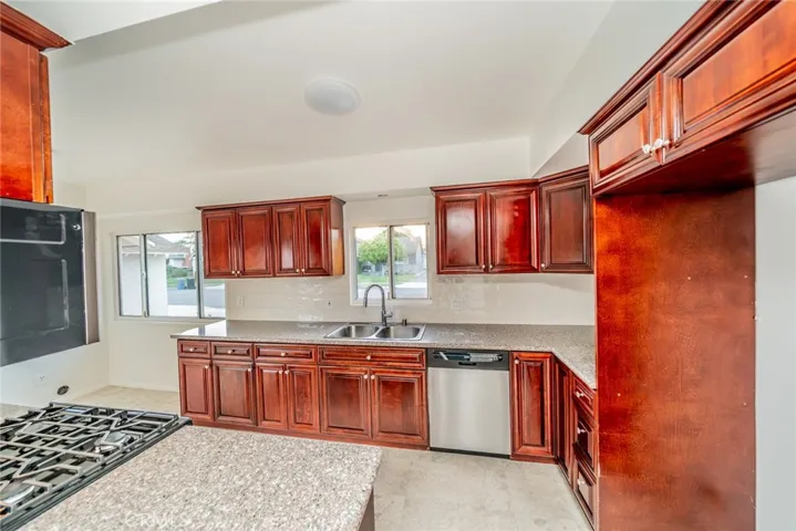 Stainless steel stove, dishwasher & microwave included.