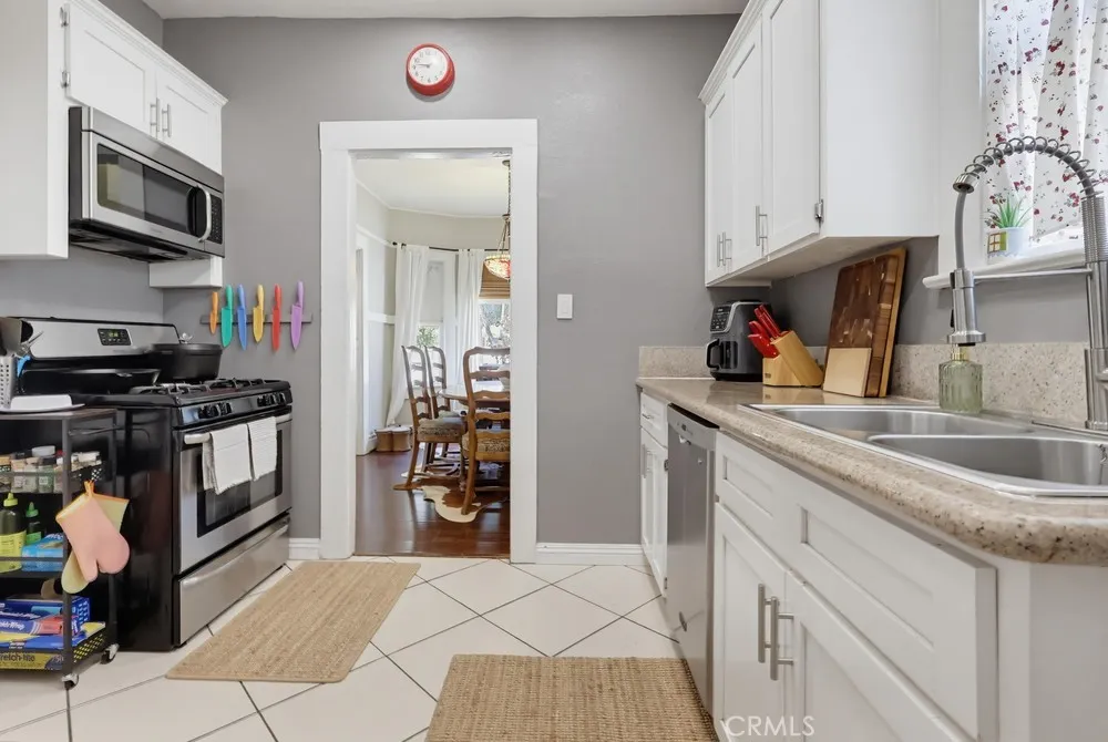 Nice kitchen with stainless steel applianes.