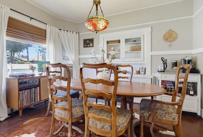 Dining room with cabinets and shelf. Charming!
