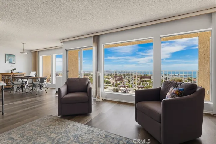 living into dining area and large private view deck